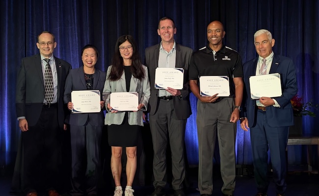 2025 ASEE Fellows posing with certificates