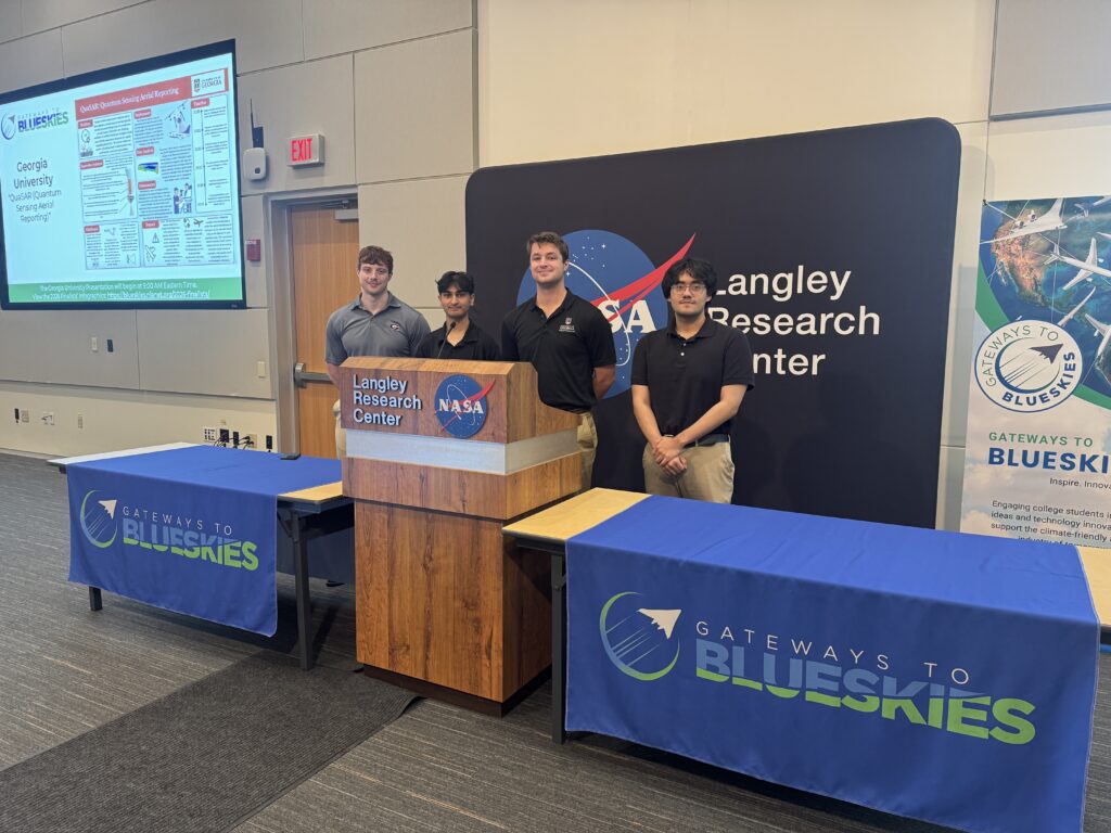 team of students posing at podium at NASA's Langley Research Center