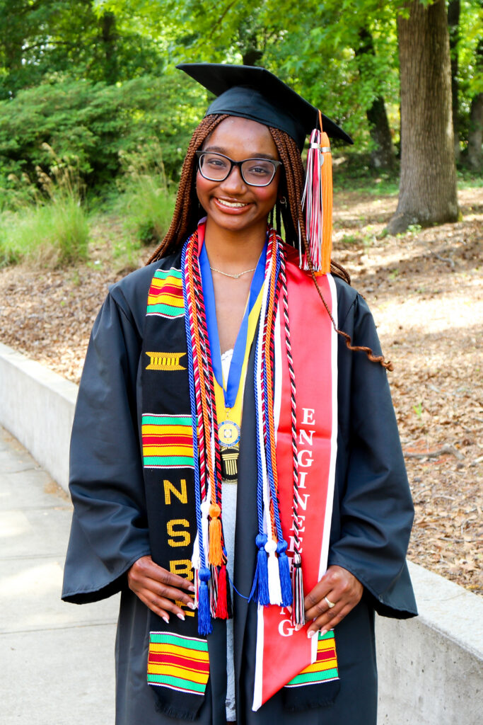 Deborah Madden wearing graduation regalia