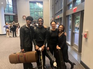 group of students with musical instruments