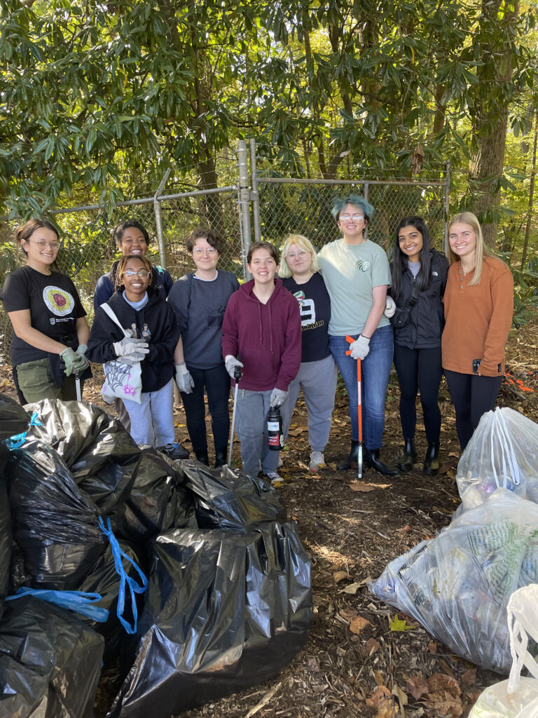 group of students picking up trash