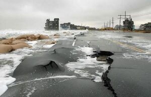 Ocean waves destroy roadway