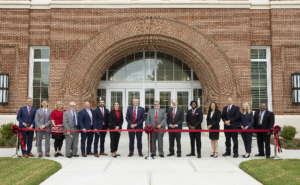 Ribbon cutting in front of new STEM research complex