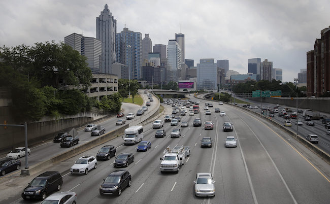 Traffic flows in and out of downtown Atlanta on the I75/I85 Connector Thursday, May 19, 2016, in Atlanta. (AP Photo/John Bazemore)