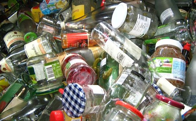 glass jars piled for recycling