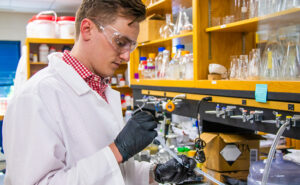 Ryan Devine working in a lab