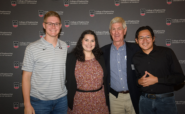 Scholarship donor Carl Riden (second from right) poses with Riden Scholarship recipients James Argo, Jessica Drewke, and Alberto Bustamante