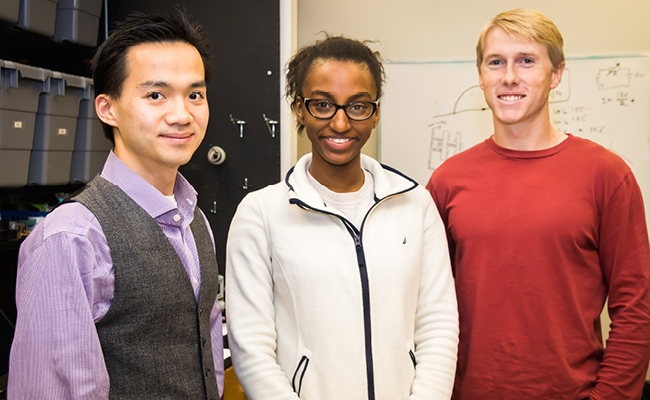 Assistant Professor Zion Tse, undergraduate researcher ChaKaria Hunter and Ph.D. student Austin Taylor